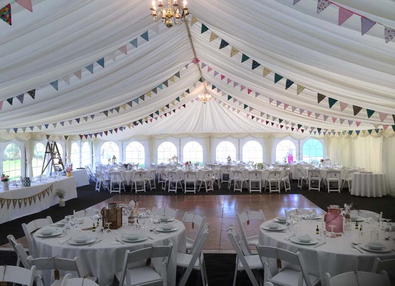 Barn Weddings and Furniture Hire Marquee with bunting